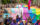 People carrying the giant flag from Pride and OURfest