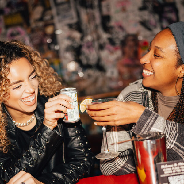 Two people cheers at Tattooed Mom in Philadelphia