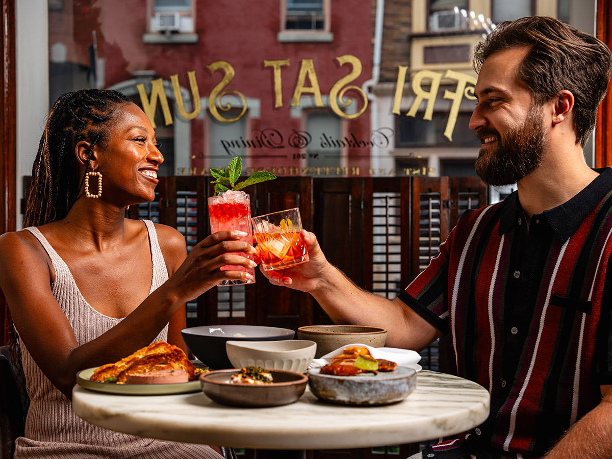 Couple eating at Friday Saturday Sunday
