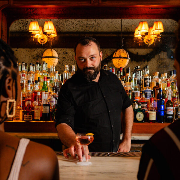 Couple and a bartender at Friday Saturday Sunday