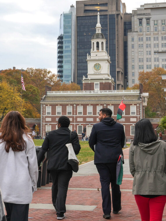 Tour group walking through Independence Mall on The Black Journey: African American Walking Tour of Philadelphia