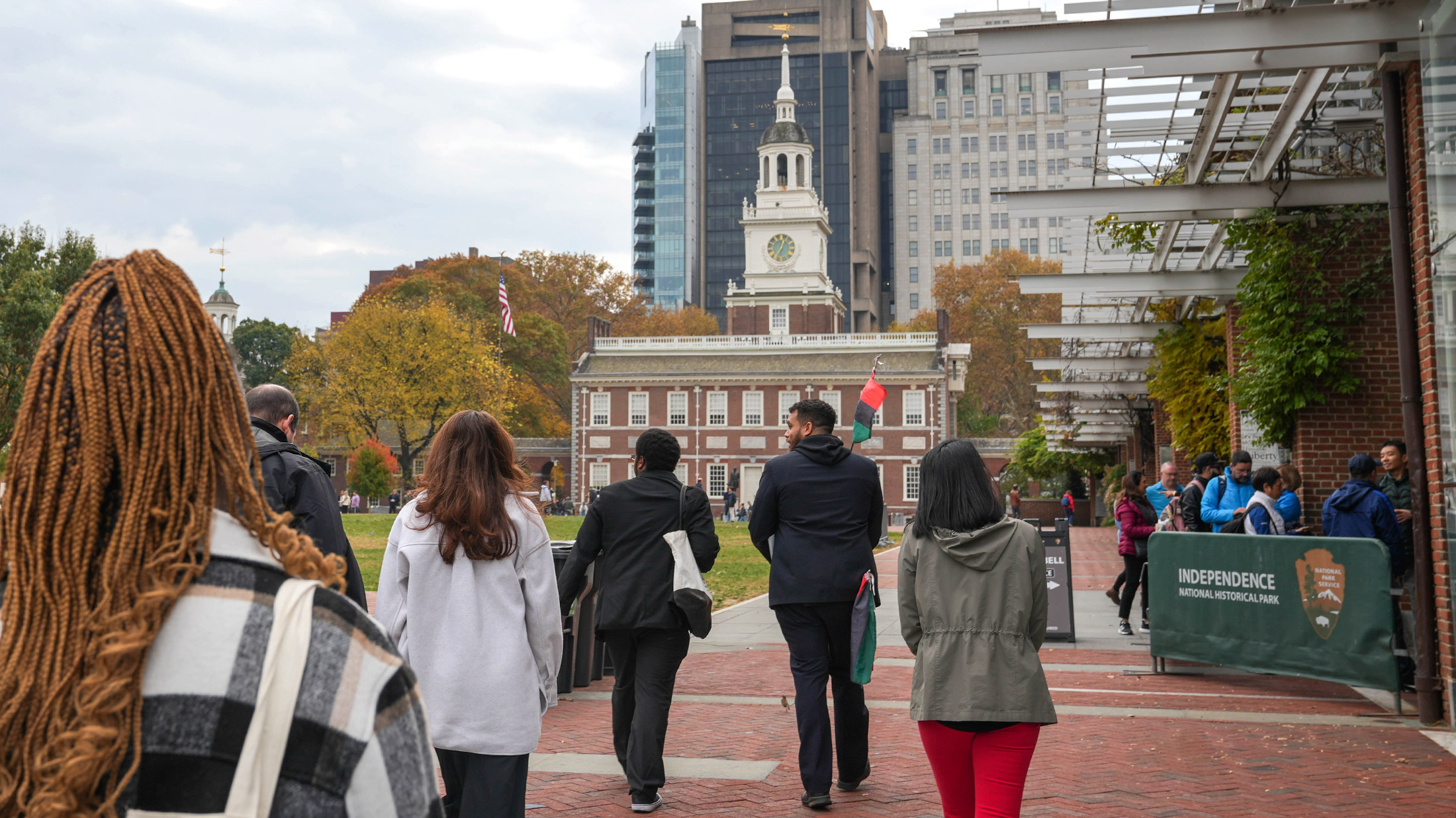 Tour group walking through Independence Mall on The Black Journey: African American Walking Tour of Philadelphia