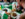 The camera looks over the shoulder of a person eating a meal at Arepa Grub Spot in Philadelphia.