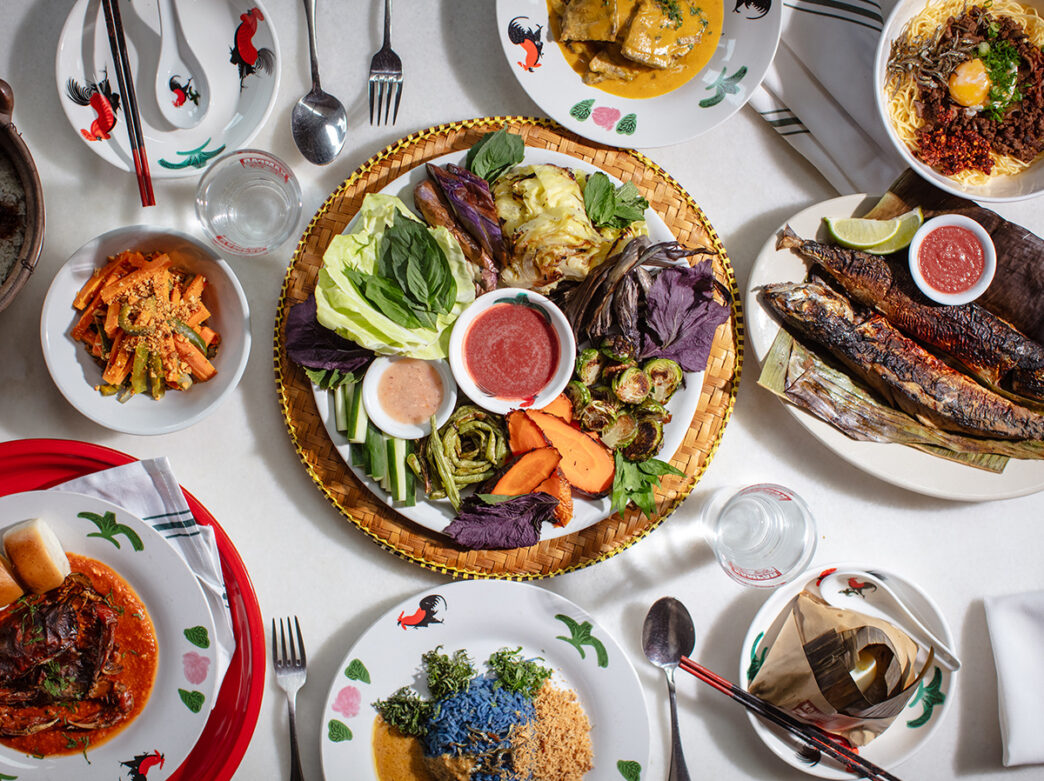Various menu items included are displayed on a white table at Kampar in Bella Vista.