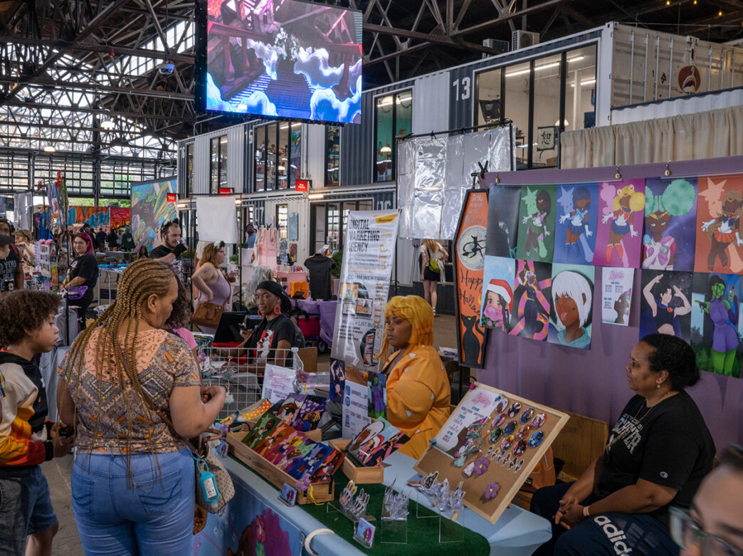 People walk around and stop at the vender booths during the Philly Otaku Fest at the Cherry Street Pier.