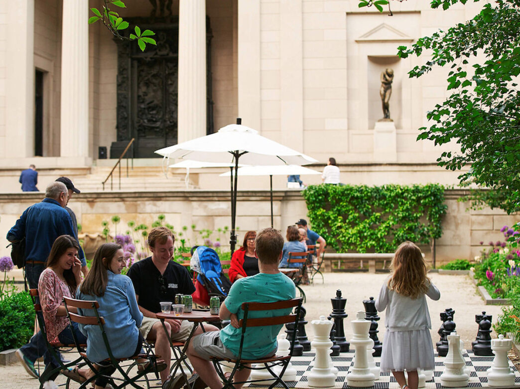 People drinking and playing at the Garden Bar at the Rodin Museum