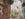 A person descends a stairway surrounding by thousands of mosaics at Philadelphia's Magic Gardens