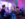 People dance together on a dance floor in front of a live band at the Barnes Foundation during a first Friday event.