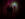 Visitors are followed down a dark hallway by a scary haunted house character.