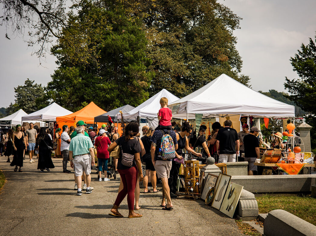 People walk around and shop at various vendors for the Market of the Macabre at Laurel Hill Cemetery.