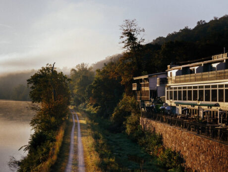 Exterior shot of the Black Bass Hotel overlooking the Delaware River and towpath.