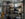Tools and hardware items are displayed in a store front on shelves and pegboard at Yuns Hardware.