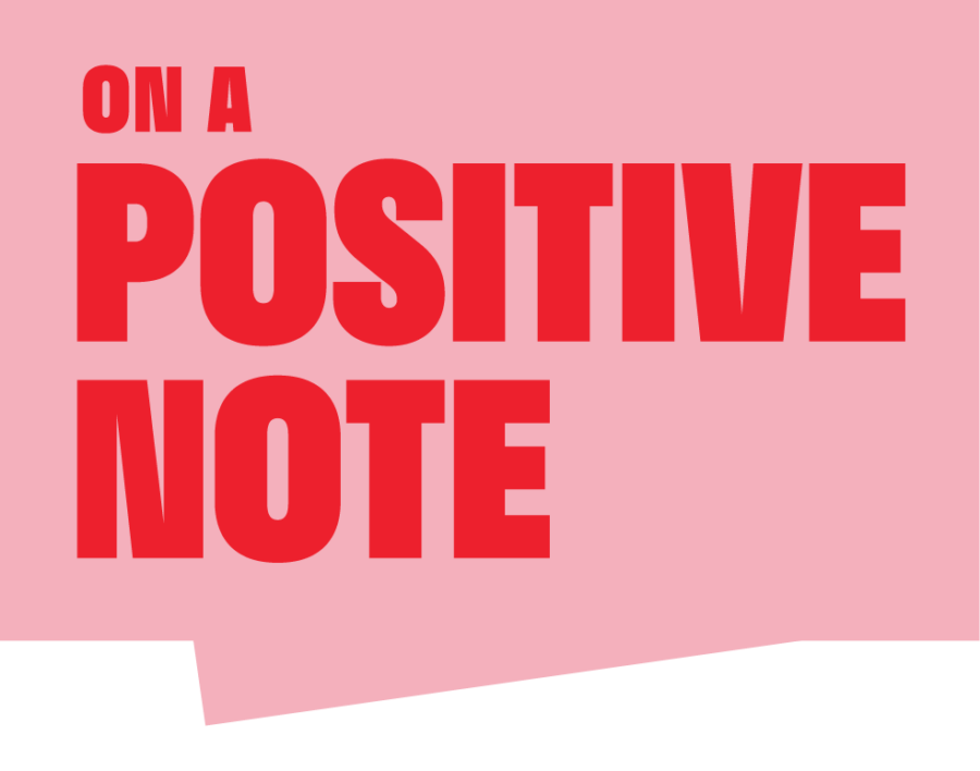 A pink graphic with red text that reads "On A Positive Note."