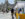 people shop at outdoor vendor tents set up in front of Philadelphia's City Hall during the Made in Philadelphia Marketplace.