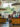 People stand at an information desk and speak to a staff member in Philadelphia Independence Visitor Center.