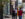 Visitors stroll down a charming street lined with historic storefronts and row homes in Philadelphia's Germantown neighborhood.