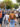 Crowds browse rows of colorful vendor tents on a closed-off street during the fall festival in Roxborough.