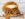 Chopped ribeye layers with sautéed onions and an egg on an everything bagel from Shay's Steaks and More.