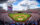 A packed Citizens Bank Park during a Philadelphia Phillies game, with fans filling the stands and the Philadelphia skyline in the distance.