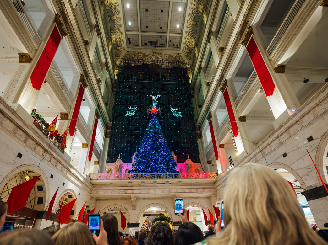 A crowd watches the Wanamaker Light Show in Philadelphia