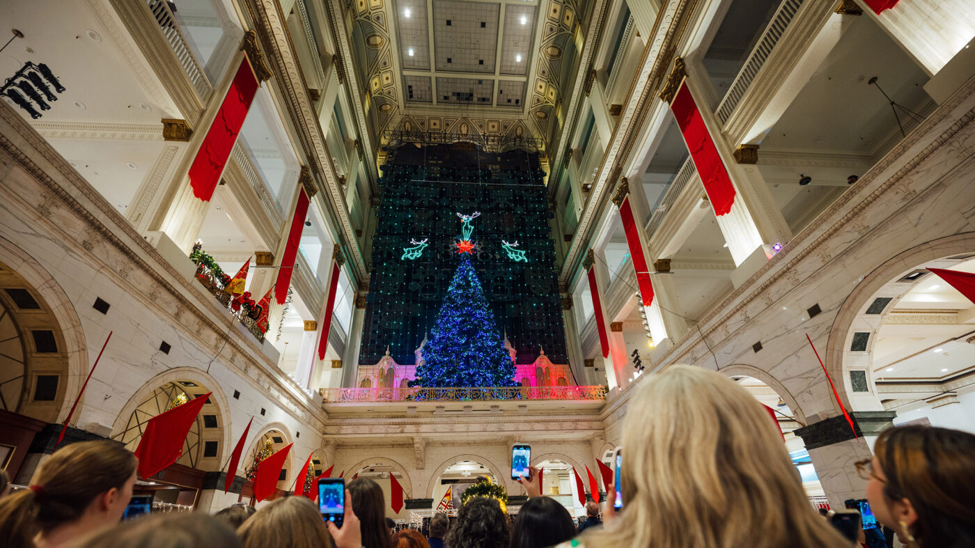 A crowd watches the Wanamaker Light Show in Philadelphia