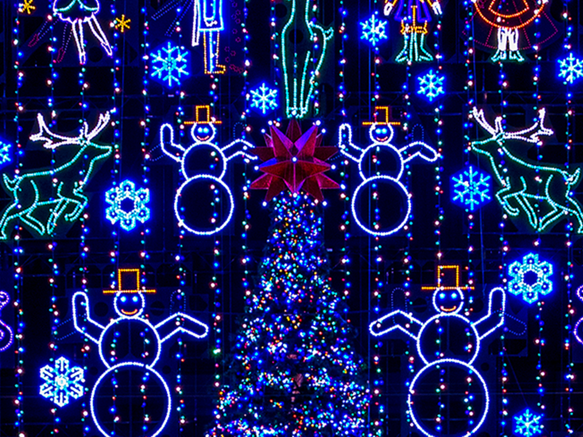 Colorful holiday lights shaped like snowmen, reindeer and snowflakes illuminate a festive display at the Wanamaker Light Show.