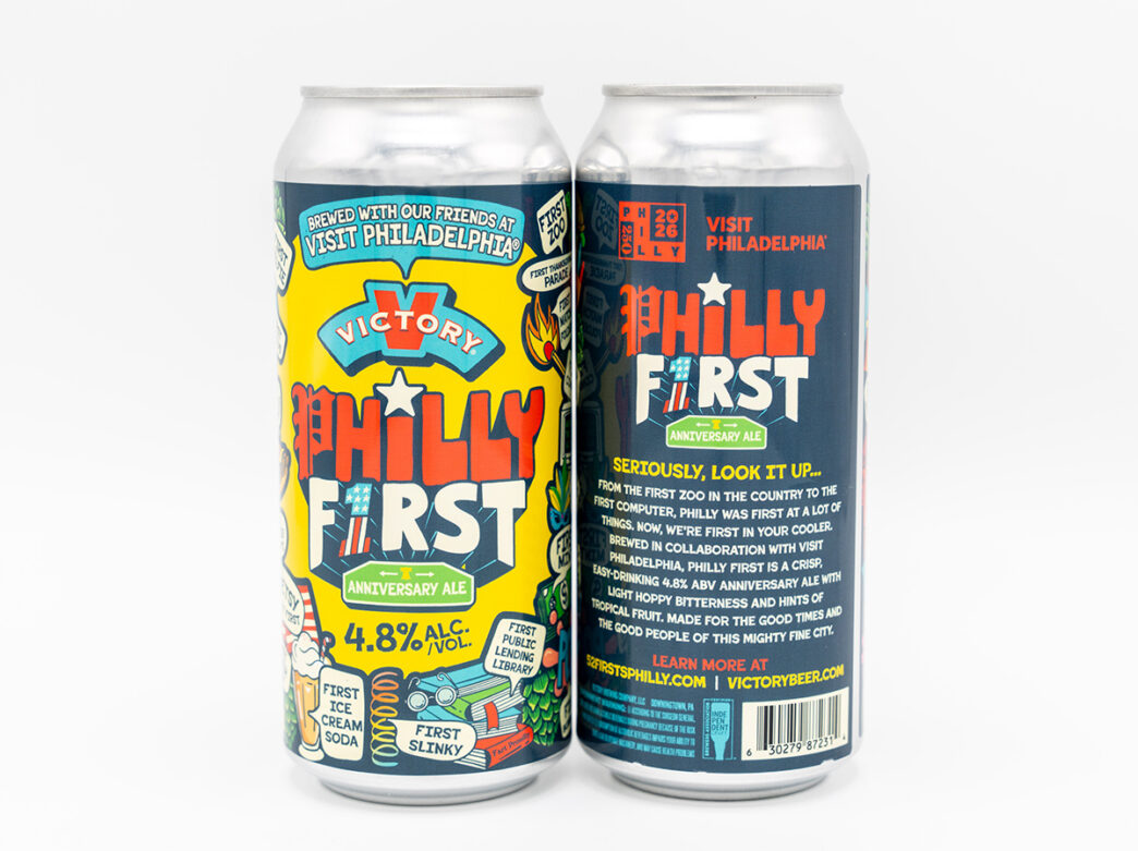 Front and back views of the "Philly First" Anniversary Ale can by Victory Brewing, showing bold red-and-blue lettering and text about Philly's many "firsts" on the back.