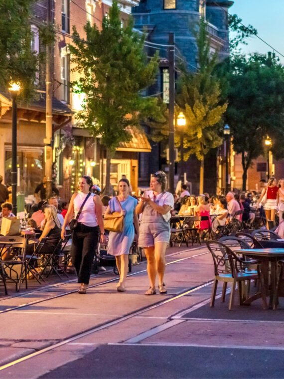 People dine and walk on the streets of Media in Delaware County, Pennsylvania.