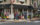 A man and two couples stand outside of a clothing store at the corner of Main and Bridge Streets in New Hope.