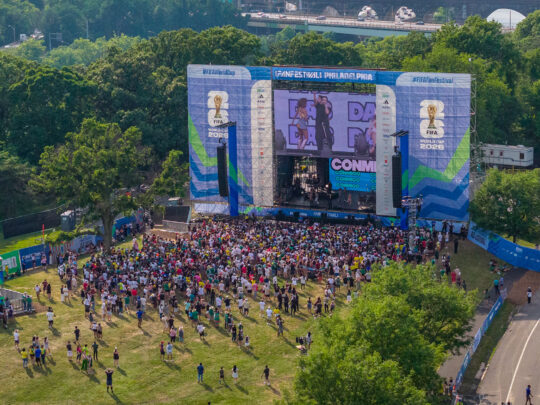 An aerial view of FIFA Fan Festival in Philadelphia, wirth crowds gathered in front of a large screen