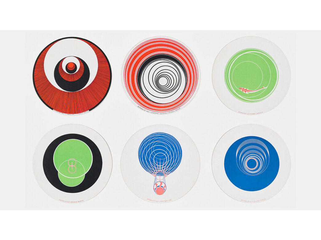 A piece of art featuring six colorful circular designs that create a mesmerizing optical illusion when spun, showcasing the artist's interest in motion and perception.