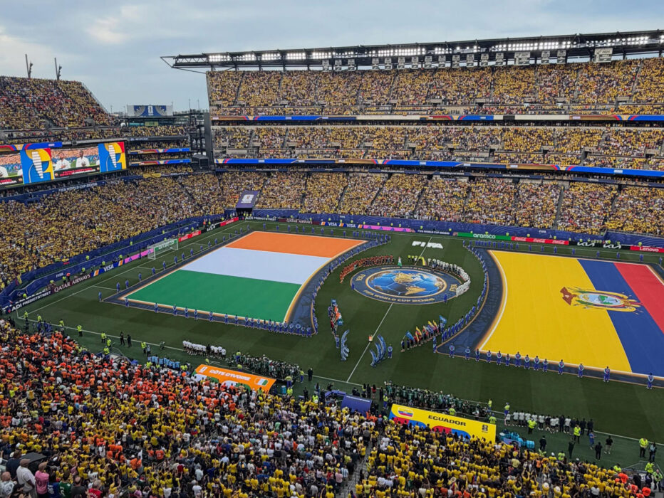 Lincoln Financial Field — known as Philadelphia Stadium for FIFA World Cup 26 — full of fans with large Côte d’Ivoire and Ecuador flags on the field during the pre-match national anthems and handshake
