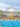 A wide view of Independence Blue Cross RiverRink Summerfest along the Delaware River Waterfront, featuring a blue roller skating rink, colorful Ferris wheel, arcade games and food stands.