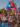 A lively crowd cheers and waves Puerto Rican flags along the Benjamin Franklin Parkway during Philadelphia's Puerto Rican Day Parade.