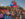 A lively crowd cheers and waves Puerto Rican flags along the Benjamin Franklin Parkway during Philadelphia's Puerto Rican Day Parade.