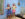 Two children smile while holding and playing colorful handmade instruments in a gallery the Philadelphia Museum of Art, surrounded by colorful decorative objects on display.