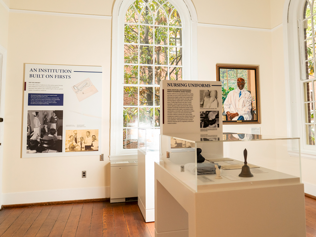 An exhibit inside the Pennsylvania Hospital Museum highlights the institution's medical history, including displays on nursing uniforms and other pioneering achievements.