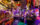 A bar is festively decorated with flowing purple and orange lights, hanging witches' hats, cobwebs, skeletons, pumpkins and other spooky decor at Craftsman Row Saloon.
