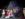 Santa and Mrs. Claus celebrate alongside performers and city officials at a ceremonial bell is rung in front of the illuminated Christmas tree and City Hall during Philadelphia's annual holiday tree lighting ceremony.